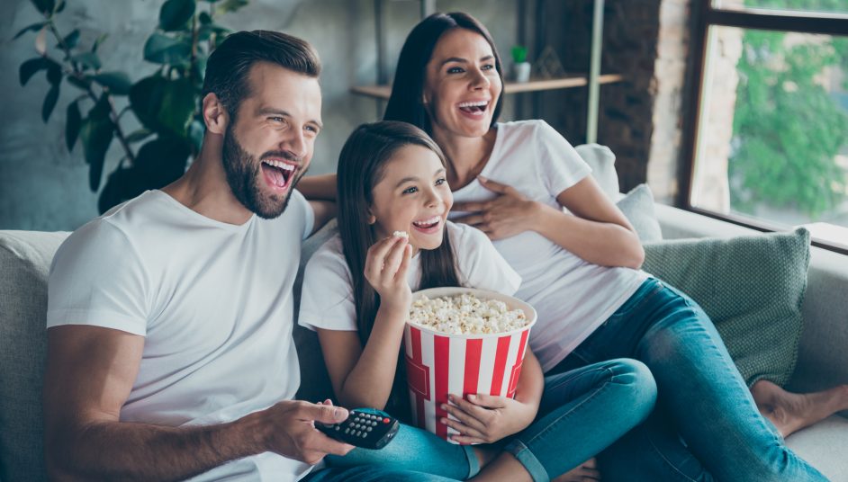 a family eating popcorn